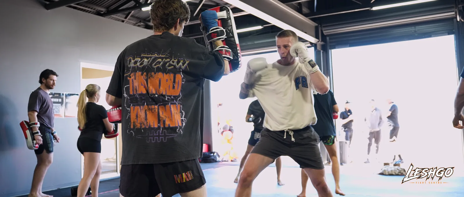 Adults MMA striking class on the mats at LeshGo Fight Centre in Bulimba